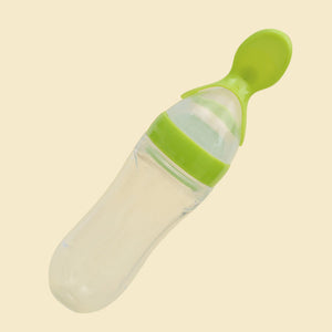 Baby-Flasche mit Löffel